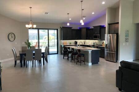 View from front entrance, patio doors open wide to lanai. 