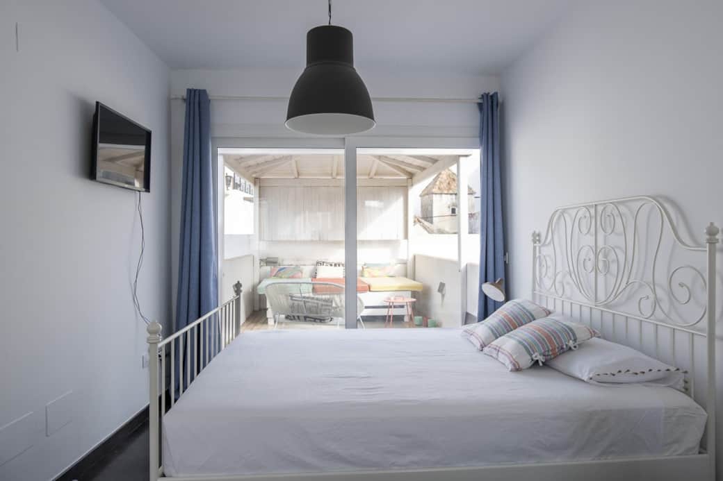 Tarifa chic rooftop penthouse main bedroom terrace view