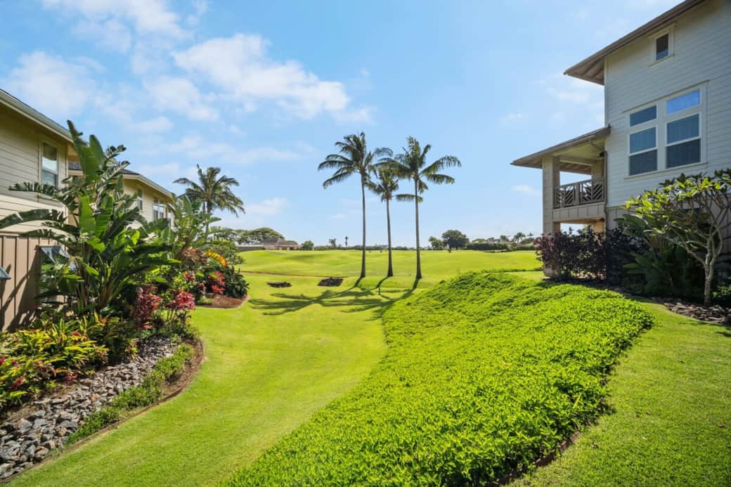 Lanai view of the 9th hole green and club house of Kiahuna Golf Course