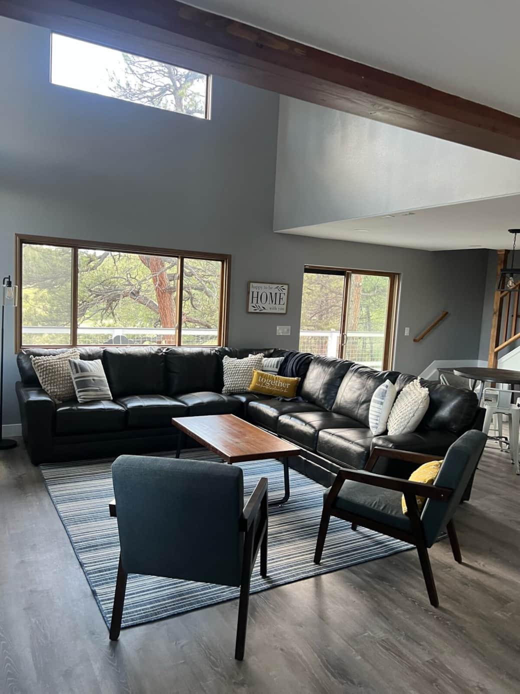 Spacious living room with flat screen TV and plenty of seating for everyone