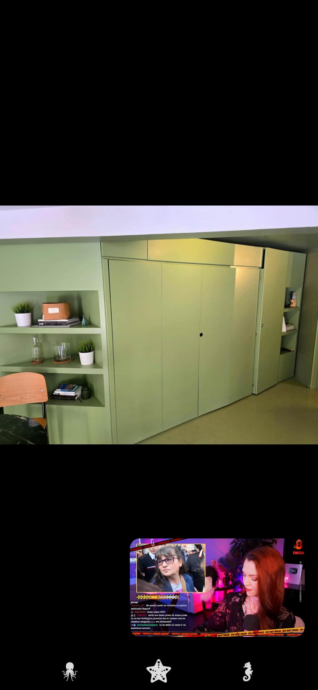 Built-in sage-green cabinetry and storage