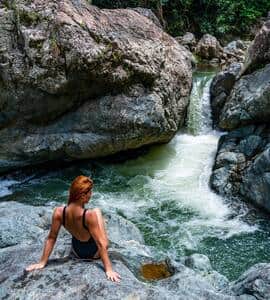 Guest enjoying a private waterfall (Available by advance booking) Guest enjoying a private waterfall (Available by advance booking)
