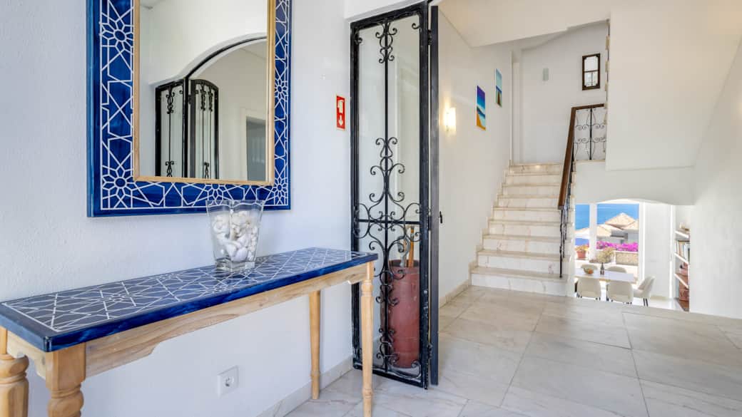 Entryway to Villa - upstairs to 4 bedroom and 3 bathrooms; downstairs to Living area and kitchen