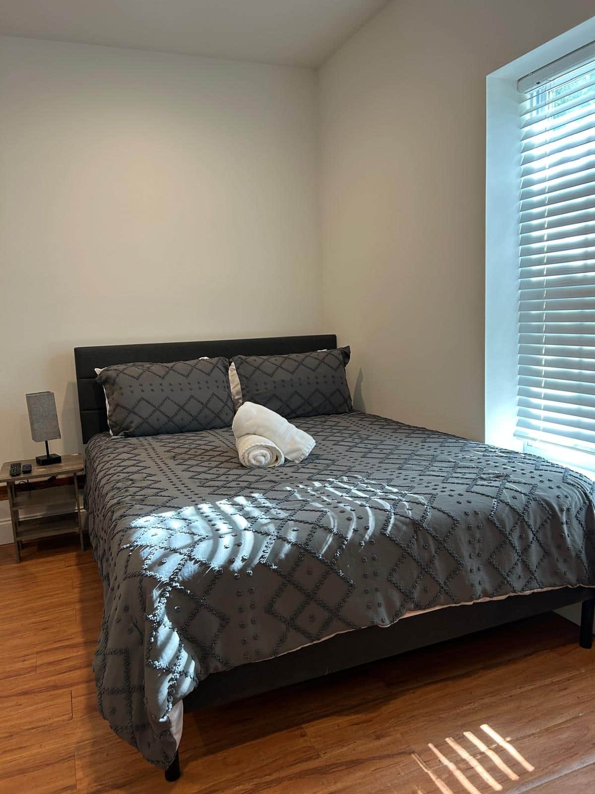 The bedroom features a queen-size bed, a desk, an accent chair and a great lighting. Lakeland, FL