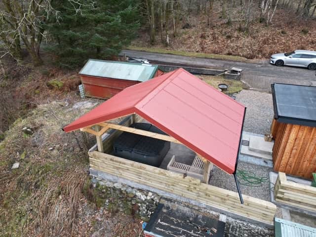 Covered outdoor hot tub beside Strathfillan Lodge