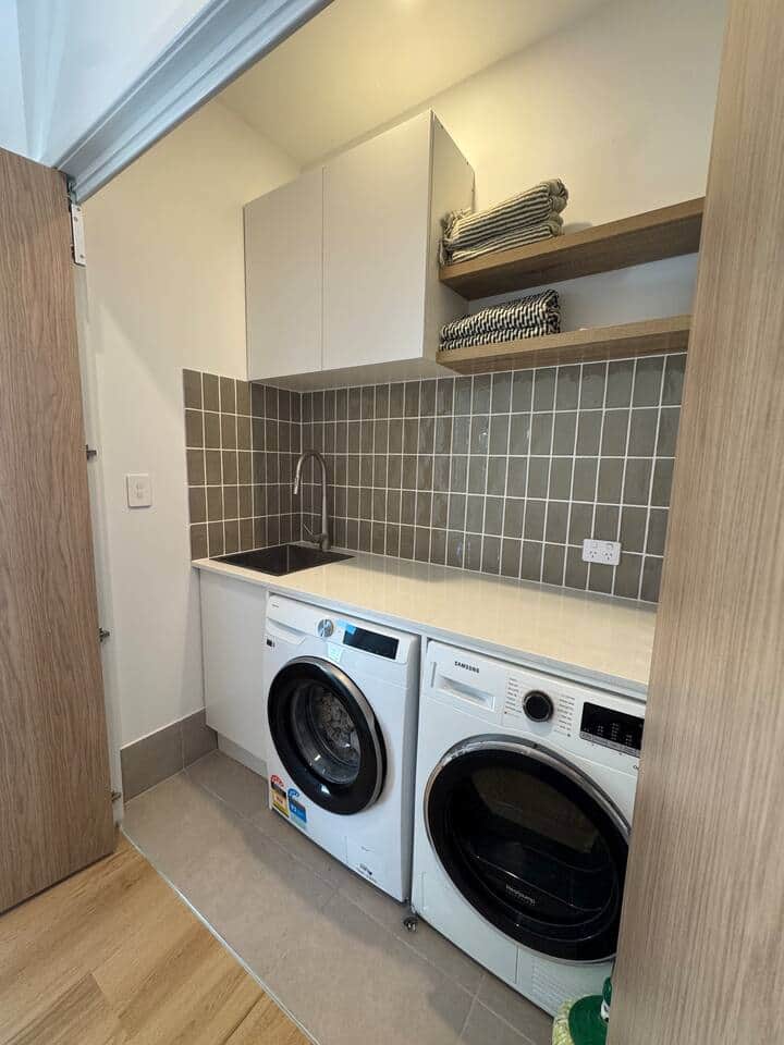 Self contained private euro laundry with washer and heat pump dryer. Laundry has iron and steamer for guests to use. 