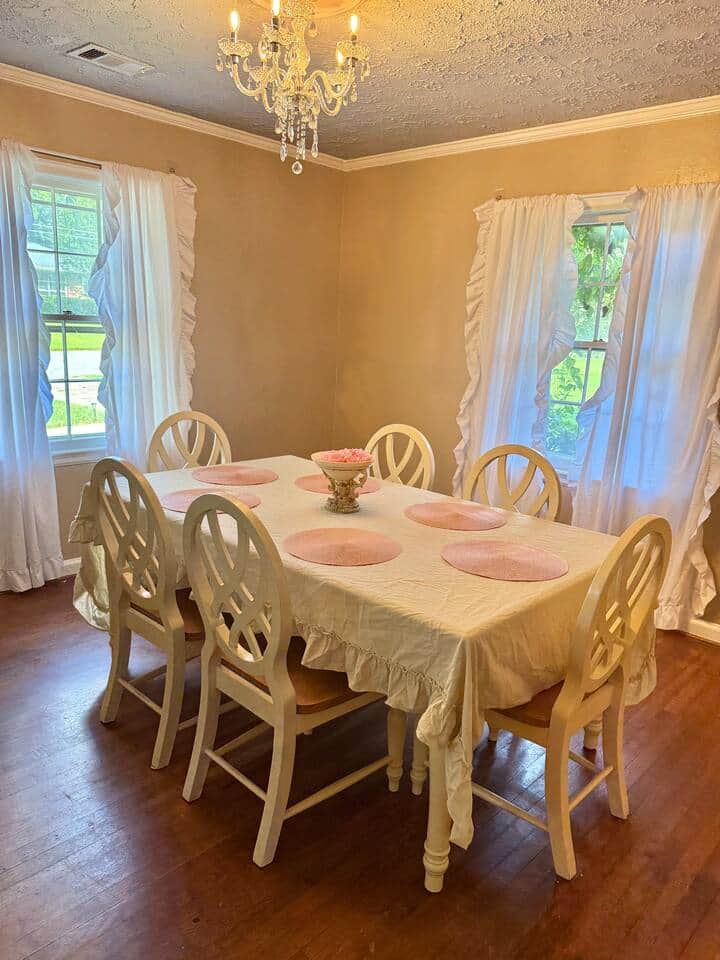 This formal dining table seats 6 people comfortably with plenty of elbow room!
