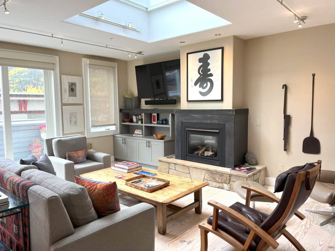 Seating area with gas fireplace and flat screen TV