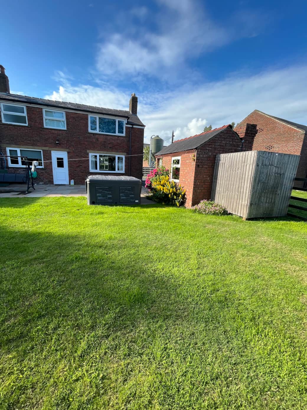 Back garden and hot tub.