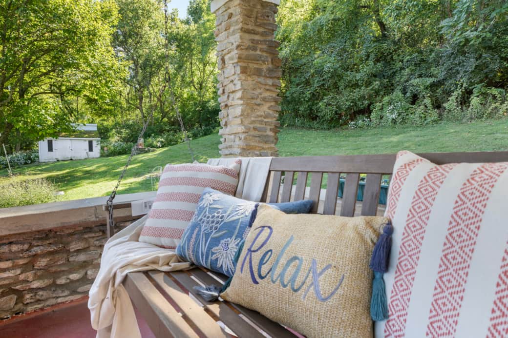 Porch swing with river views