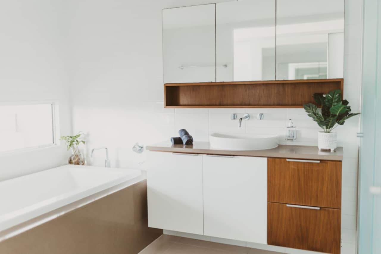 Ensuite bathroom with bath and views to river