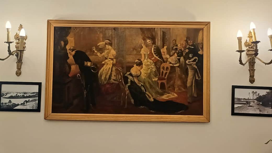A stunning vintage painting that adds character to the space.