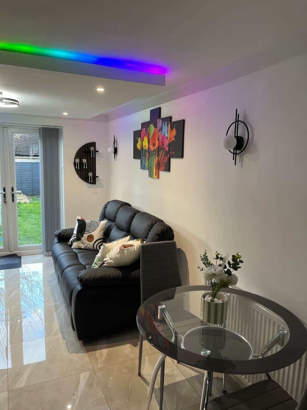 Spacious living dining area with recliner sofa and mood lighting, underfloor heating