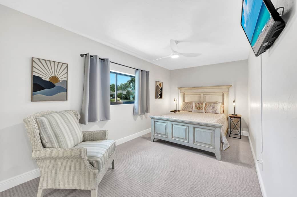 Queen size bedroom, with a multi-angle TV. Full bathroom #3 is just down the hall. 