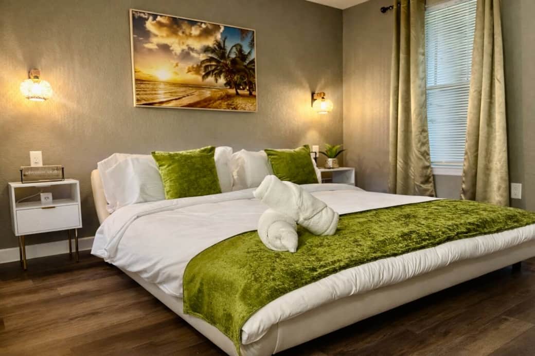 Master bedroom suite with king bed and private bathroom Master bedroom suite with king bed and private bathroom