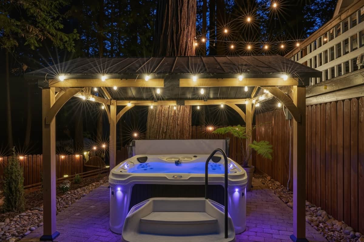 Hot Tub — Private spa under the gazebo at night