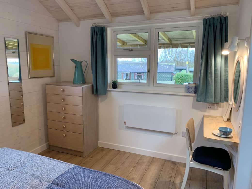 This is the view from the king size bed towards the front of Pot Luck. There is storage and over to the right there is a dressing table area with good lighting. This is the view from the king size bed towards the front of Pot Luck. There is storage and over to the right there is a dressing table area with good lighting.