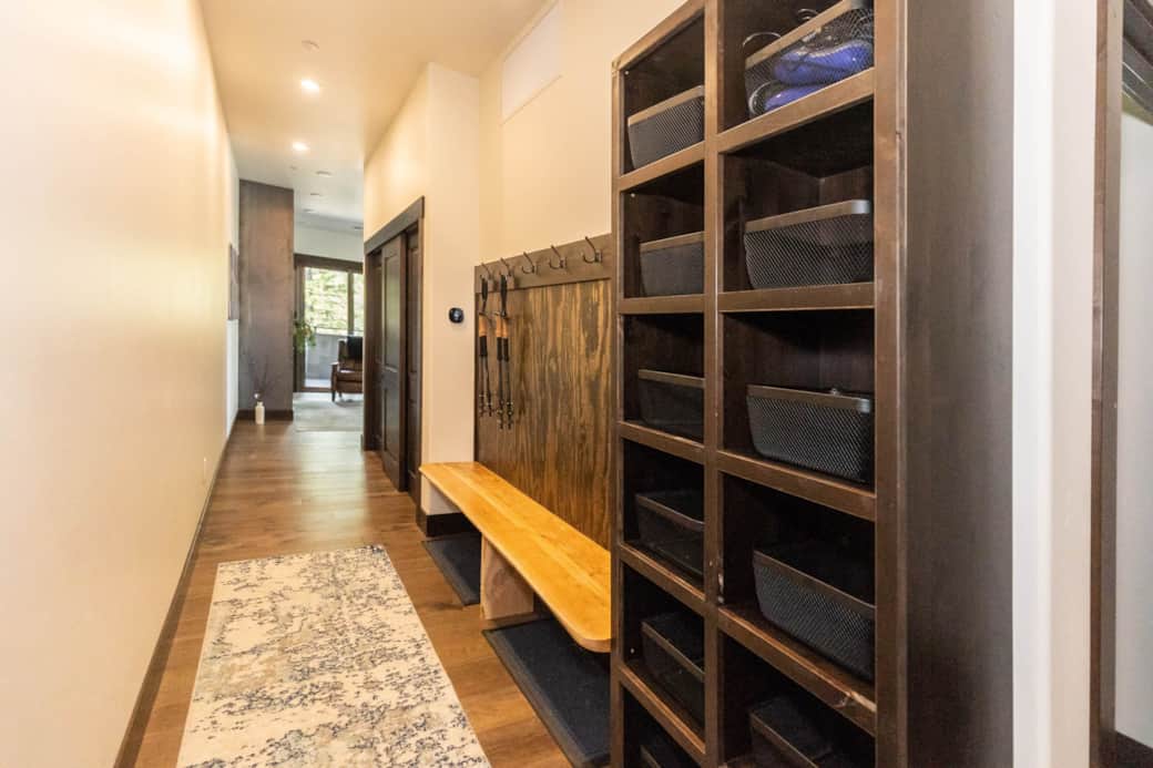 Entry way with hiking poles and boot dryers 