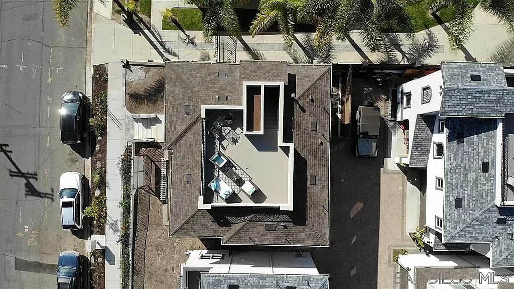 Aerial View of Property and Private Rooftop