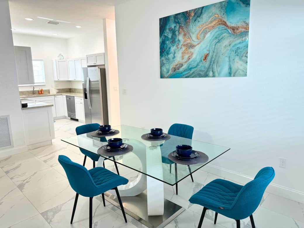 Dining Room – Stylish dining area with seating for four.