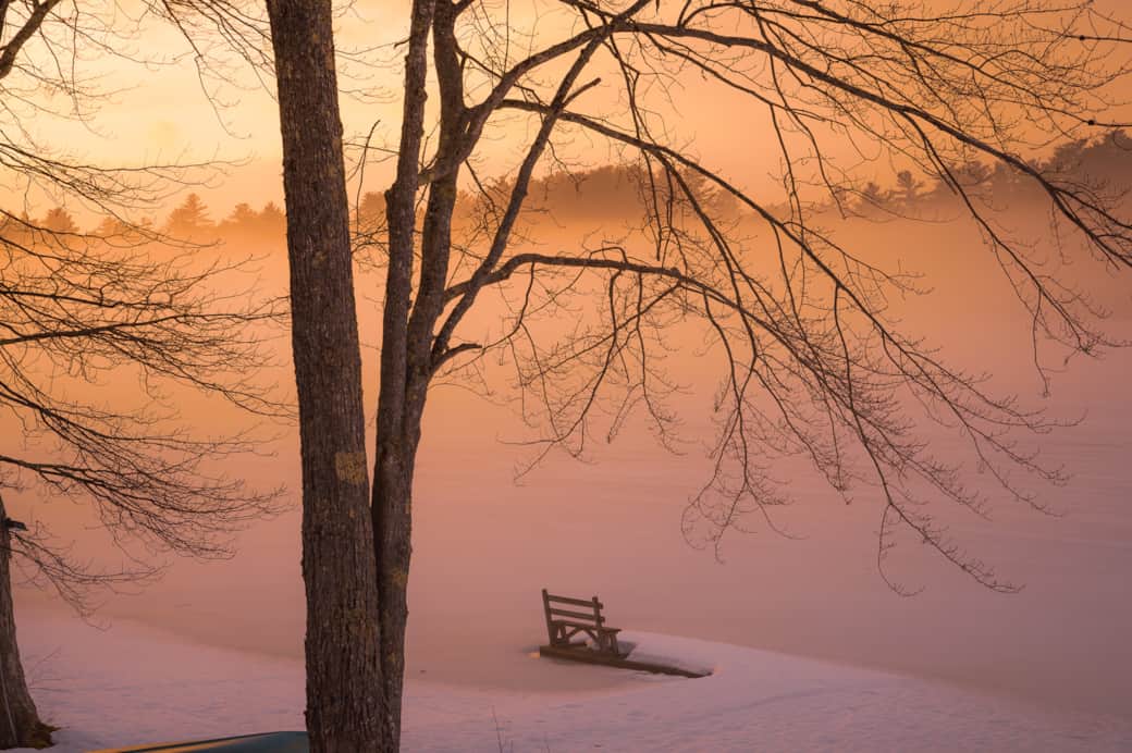 Pink morning mist on the snow-covered lake. Pink morning mist on the snow-covered lake.