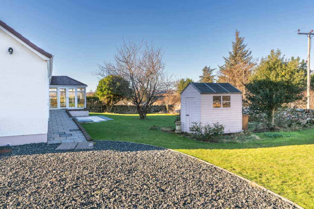 The spacious garden and surrounding area offer plenty of room for outdoor activities and pets to roa