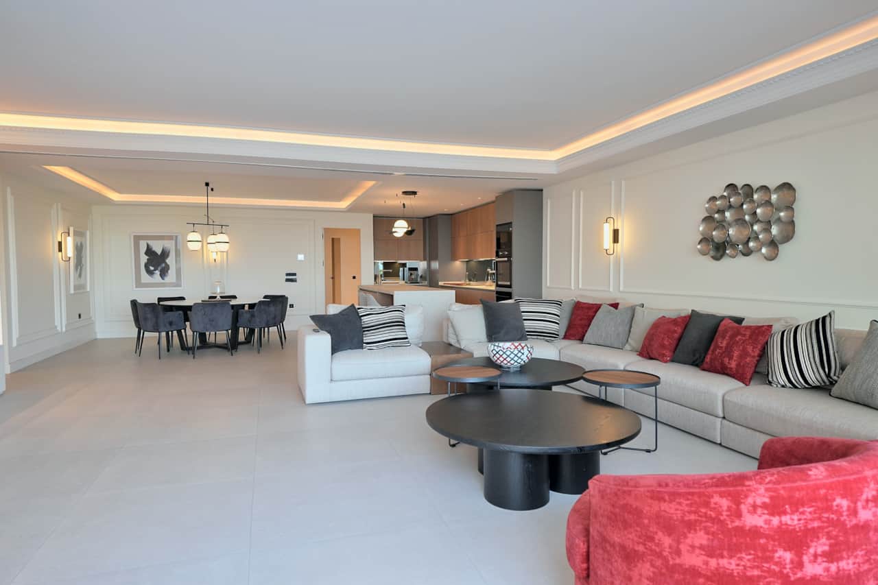 Open-plan living room with dining area behind