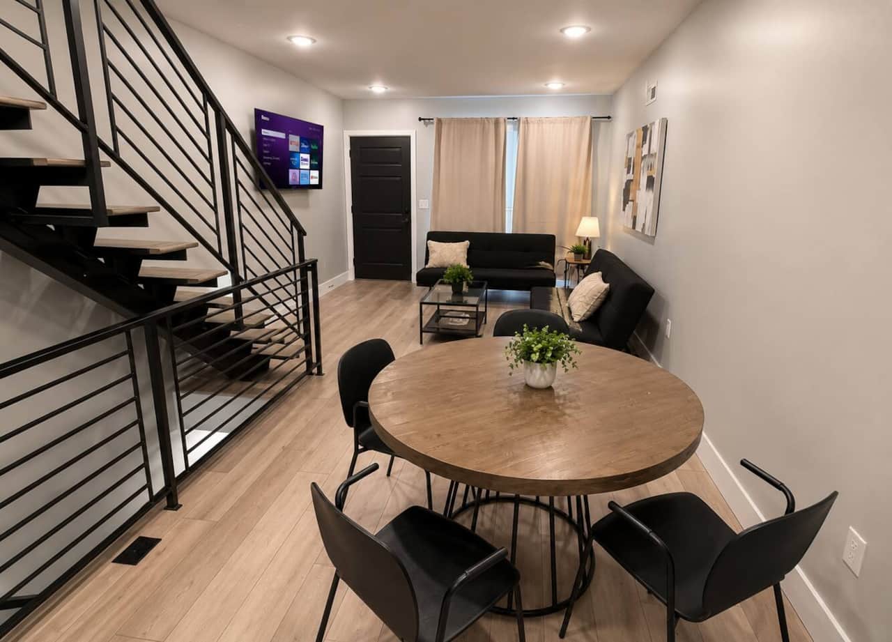 dining table with seating for four, perfect for enjoying meals, morning coffee.
The open-concept layout flows seamlessly into the living area, creating a bright and inviting space for relaxing and spending time together.