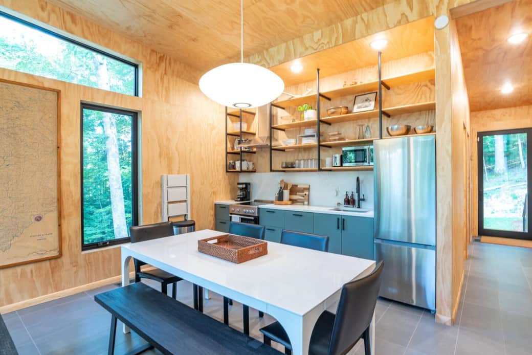 Sleek, modern dining with a Nelson saucer light and seating for 6. Enjoy Scandinavian-inspired design in this functional space for meals and conversation