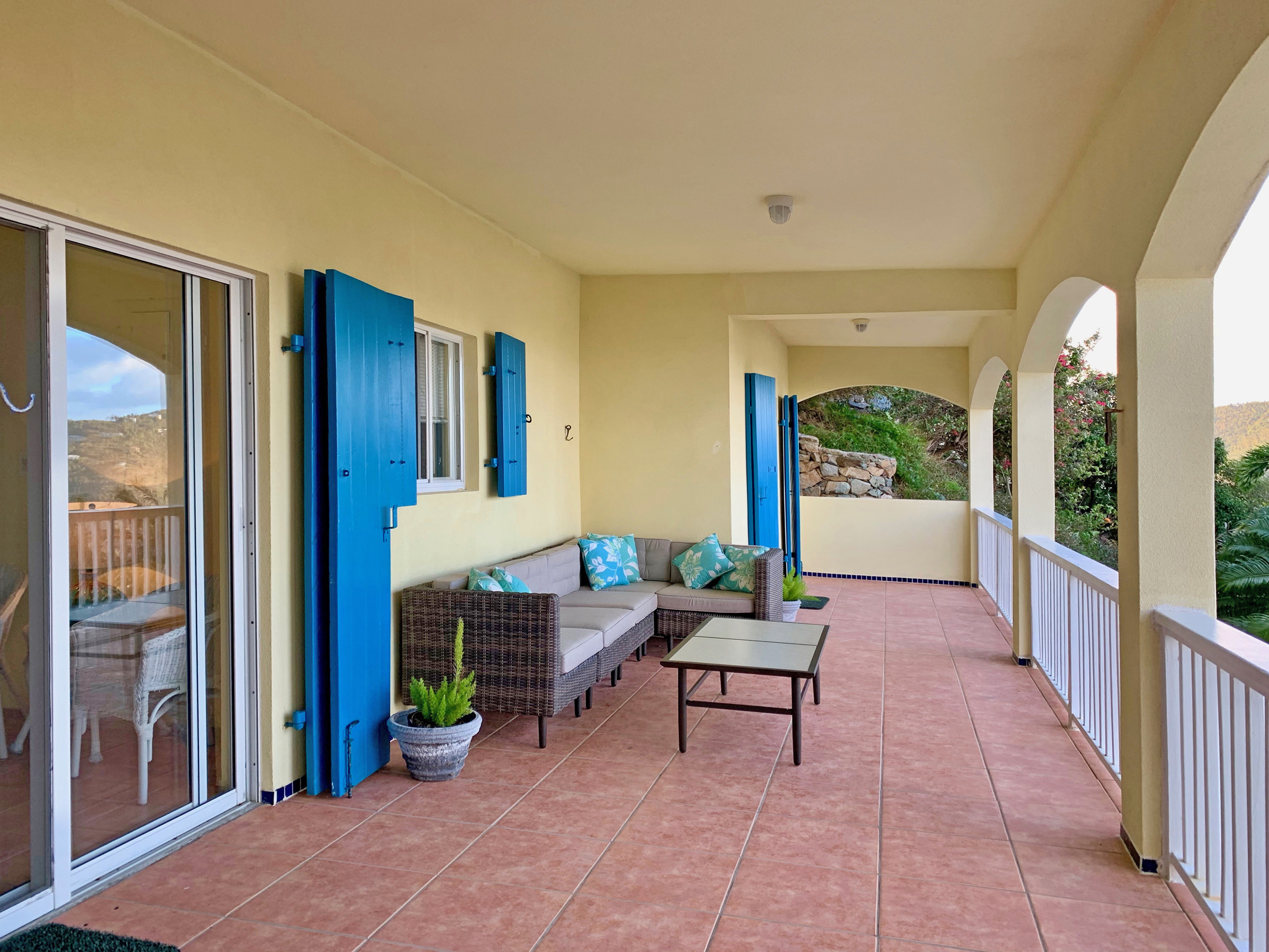 Mid level veranda and outdoor seating