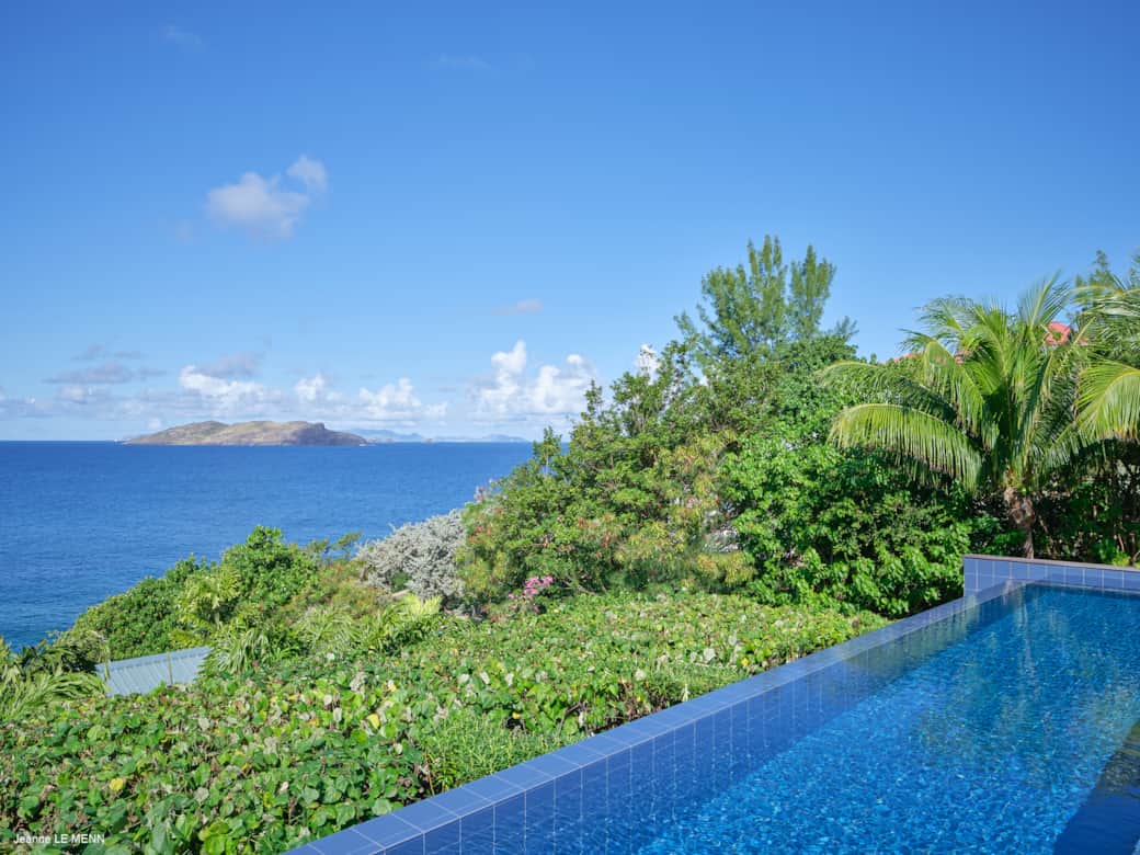 Exterior view of Villa Pointe Milou, a luxury oceanfront villa with infinity pool and panoramic sea 