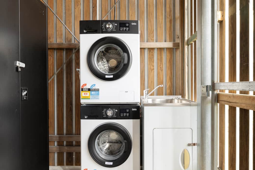 Shared Laundry Area: Washer available for convenient laundry needs 