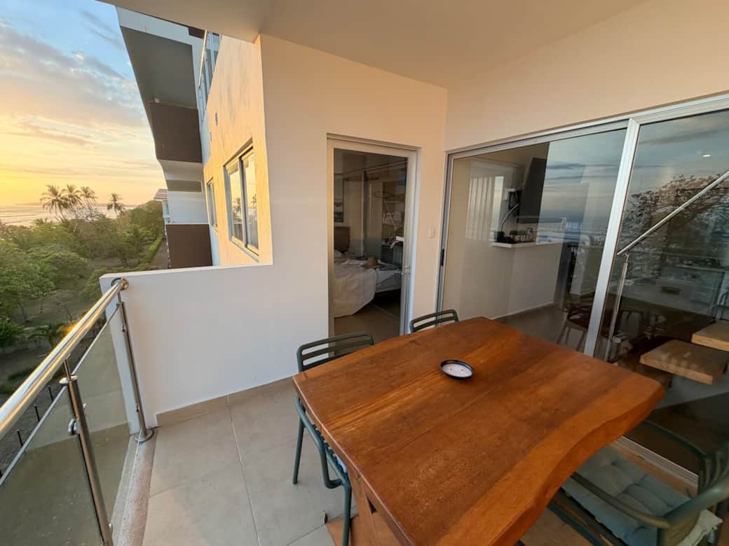 Lower Level Balcony off of Main Living Area provides easy access from Living Room and Primary Suite. Enjoy Morning Coffee and take in the Sunsets in the Evening. 