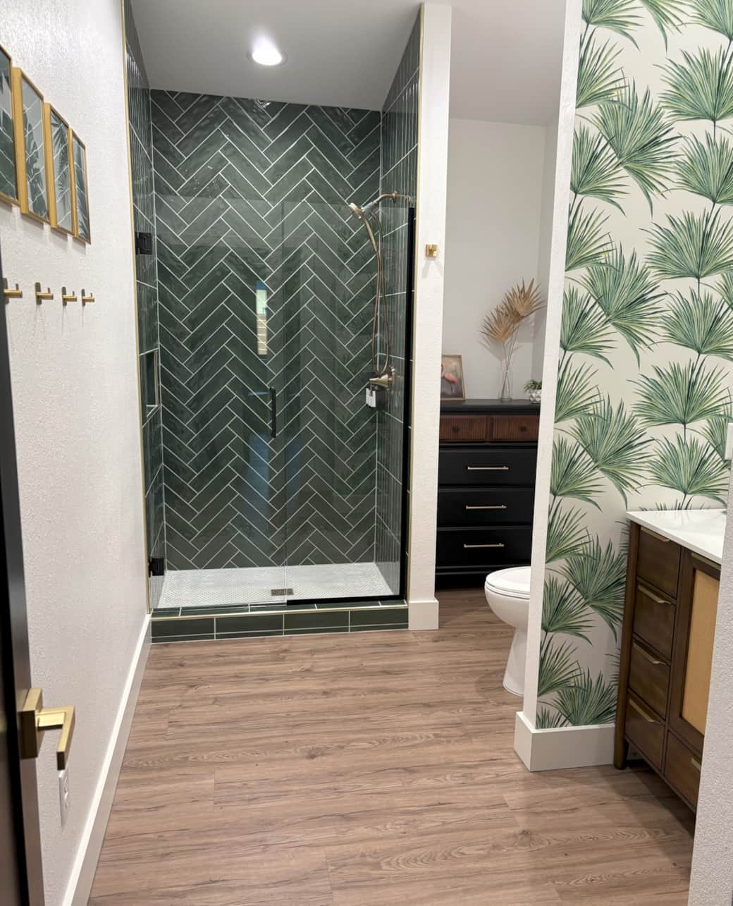 Beautiful Main bathroom with custom tiled green shower and washer/dryer