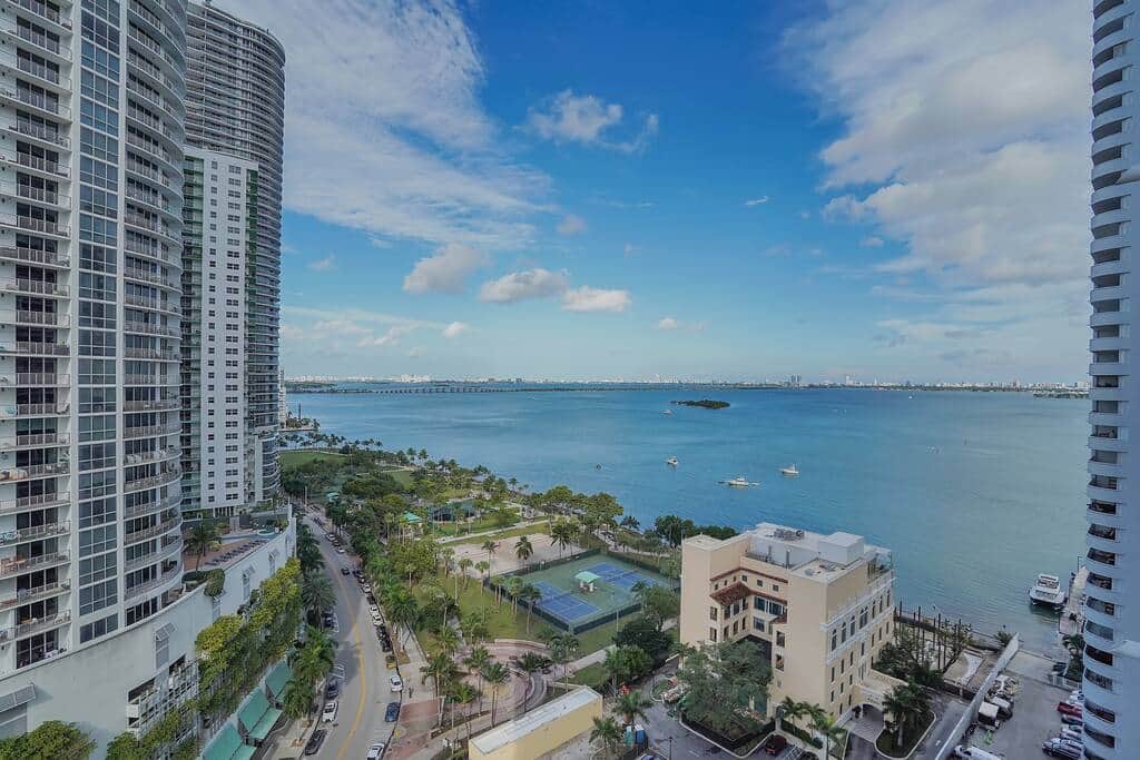 Furnished balcony with water views of Biscayne Bay and views of Margaret Pace Park