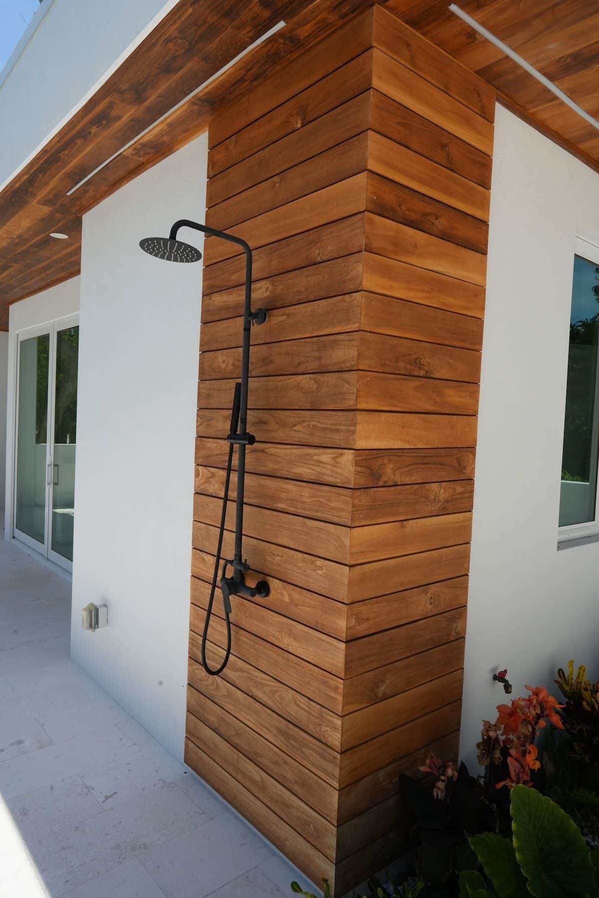 Shower is on the side of Pool Cabana