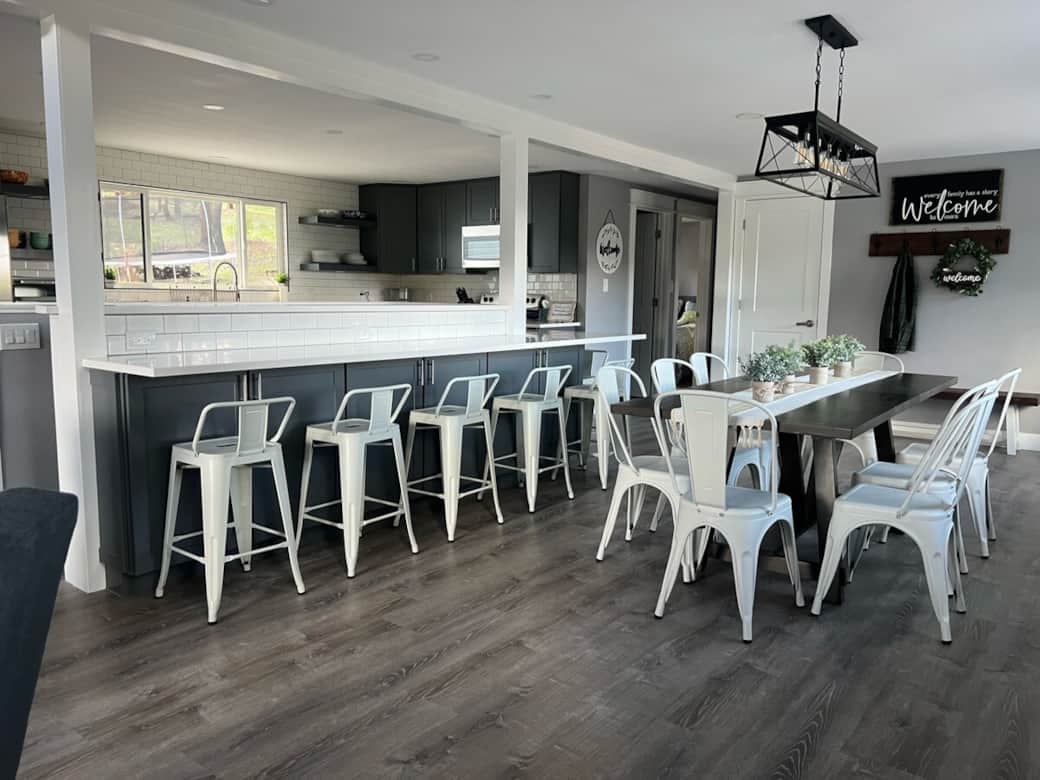 Dining room table and barstool, seating for eight at the table and eight at the barstools