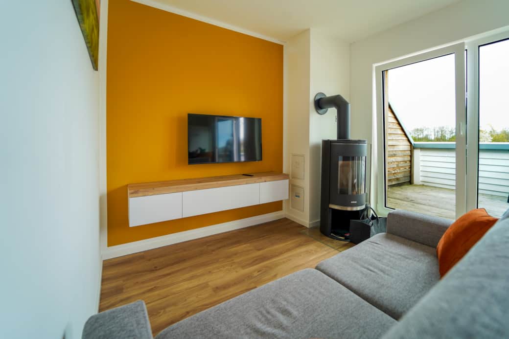 Wohnzimmer mit Kamin