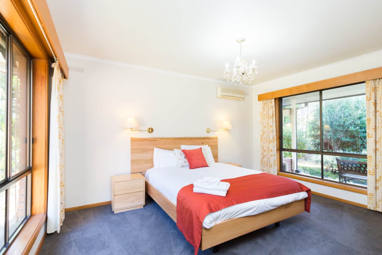 Bedroom One: Queen bed for comfort and relaxation.