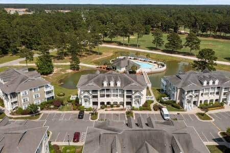 Ariel view of condo, pool is directly behind it Ariel view of condo, pool is directly behind it