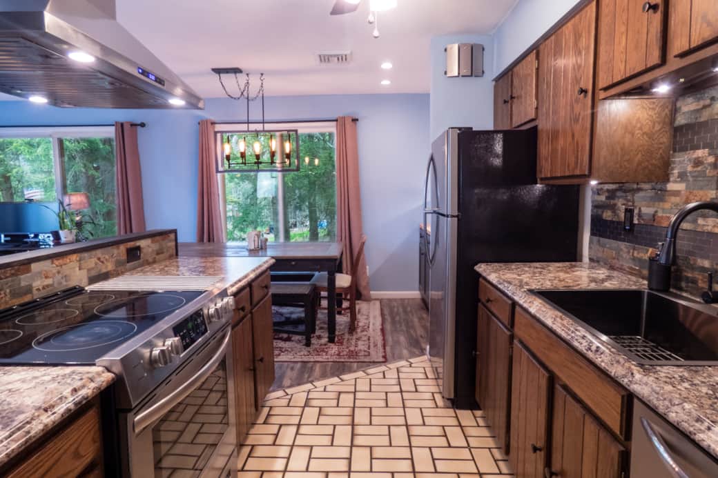 Glass cooktop and plenty of counter space for meal prep. Glass cooktop and plenty of counter space for meal prep.