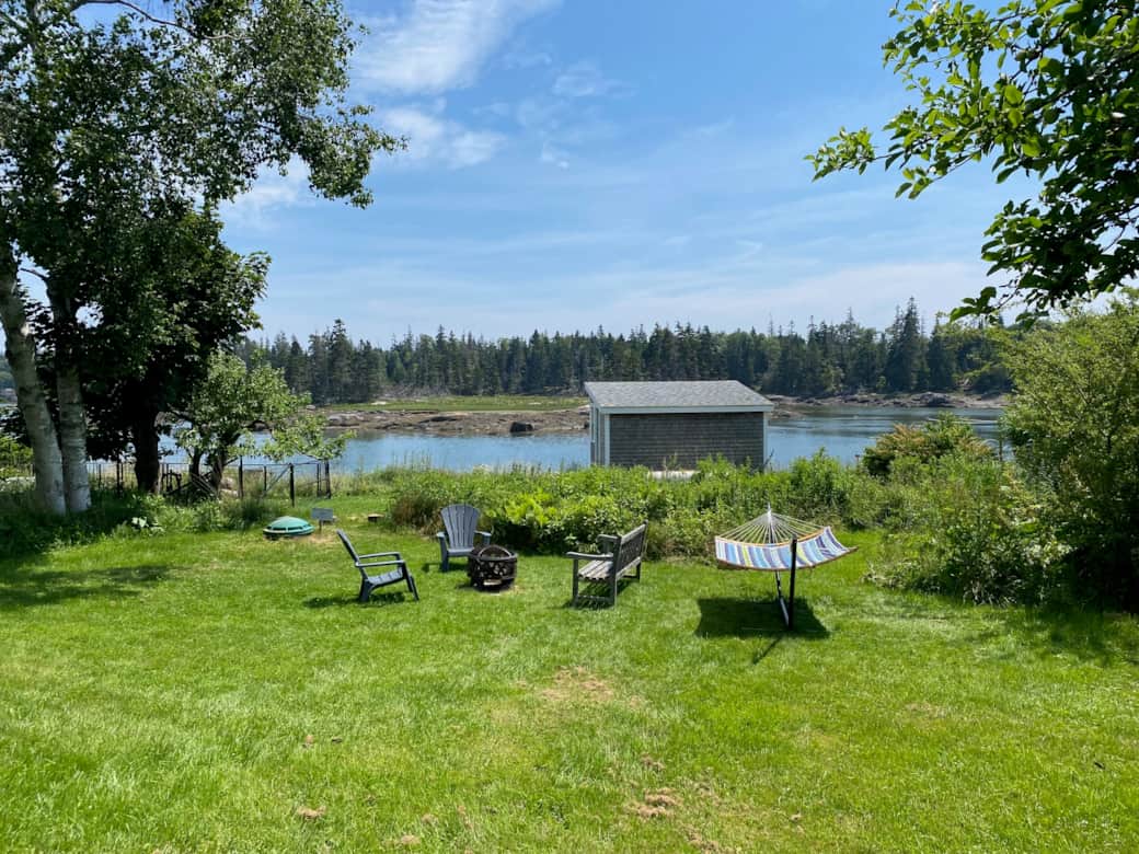 View of Indian Creek with firepit and hammock