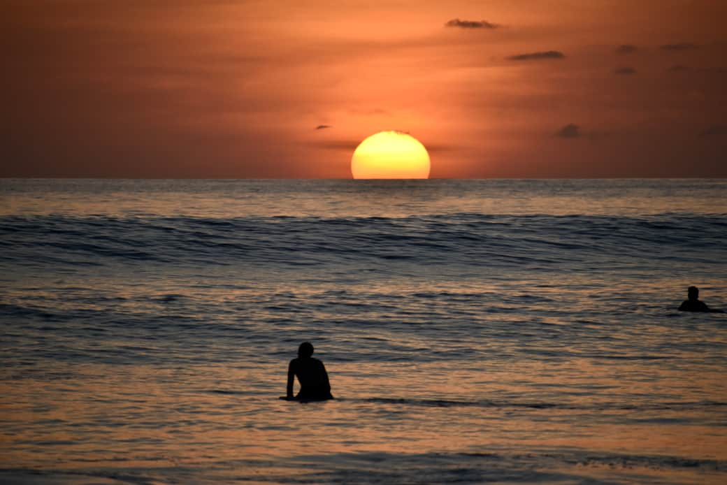 Surfing at sunset, time for yourself