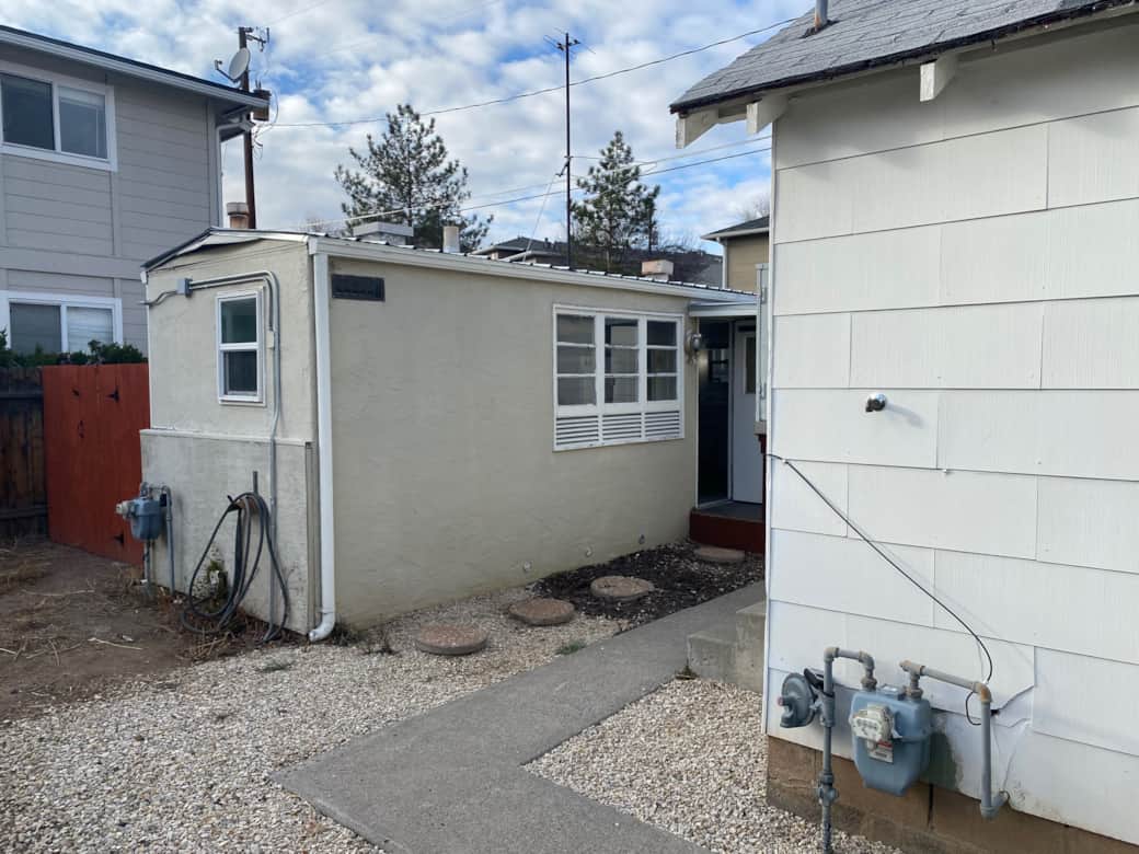 Walkway From the Front of the Property to the Back Where the Unit is Located Walkway From the Front of the Property to the Back Where the Unit is Located