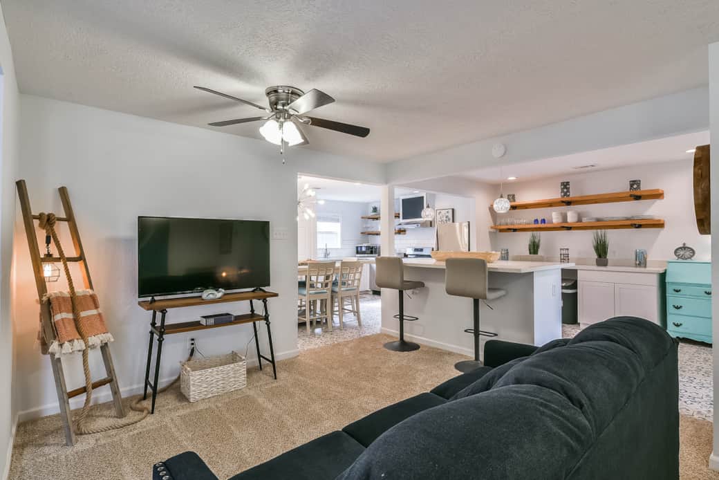 The living room features plush couches and flat screen smartTV The living room features plush couches and flat screen smartTV