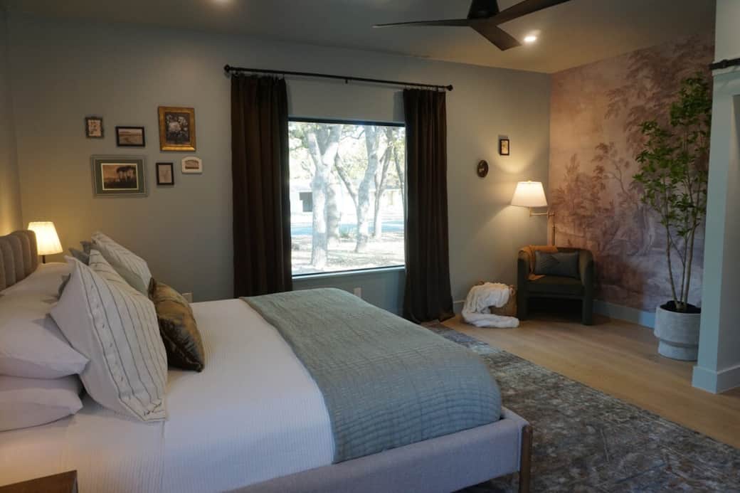 bedroom 1 faces the street and driveway.  blackout curtains help to make sure you have a restful night of sleep