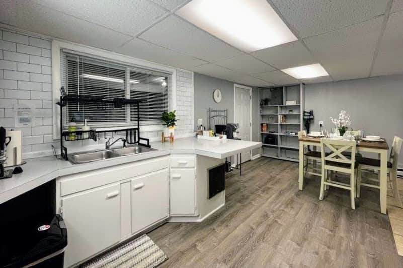 roomy kitchen for a 1 bedroom! cookware and dinnerware are provided