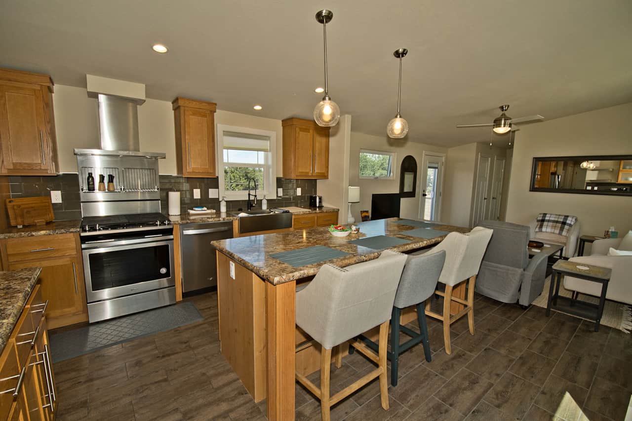Fully Stocked Kitchen with Island Dining