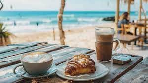 Cappuccino and croissant on a terrace in Playa del Carmen