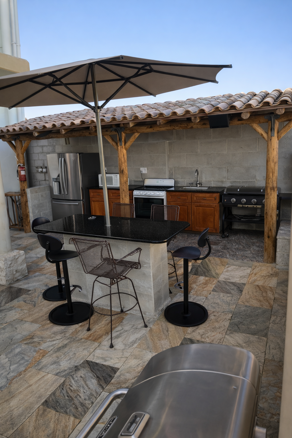 Outdoor kitchen with rustic charm 